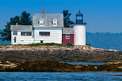 Blue Hill Bay Lighthouse On Rocky Shore At Low Tide in Maine